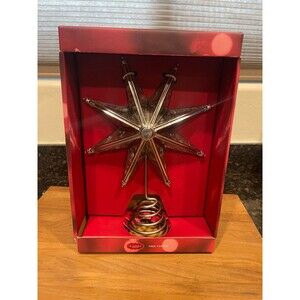 New in box St. Nicholas Square Silver Finish Star tree topper